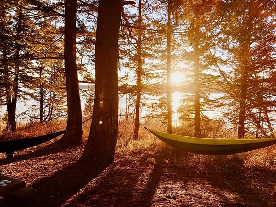 how to sleep in a camping hammock
